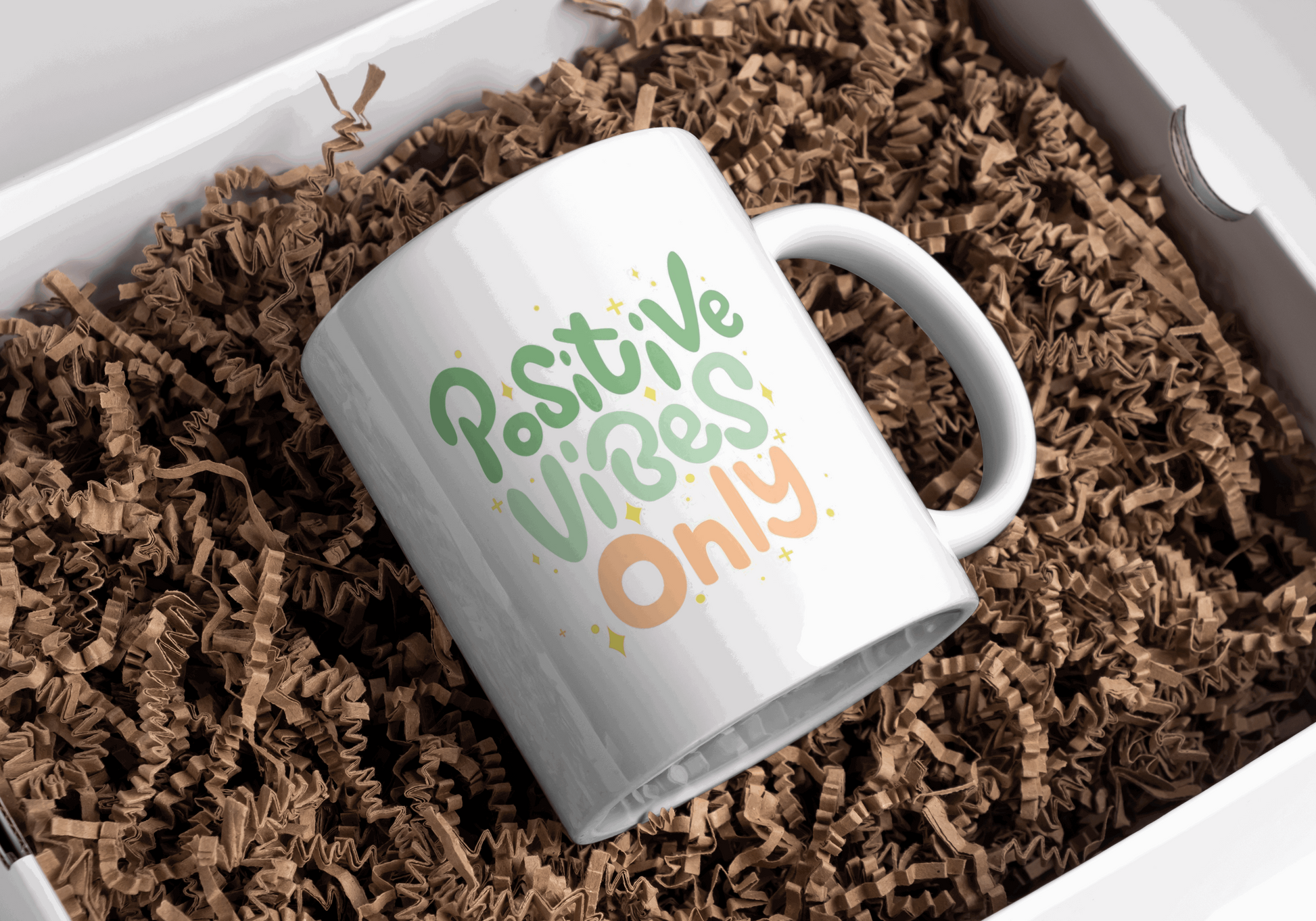 ceramis coffee mug with a positive vibes only message.