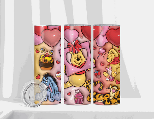 Winnie the Pooh, Eeyore, and Tigger featured on a Valentine's Day themed tumbler with heart balloons and sweet treats.